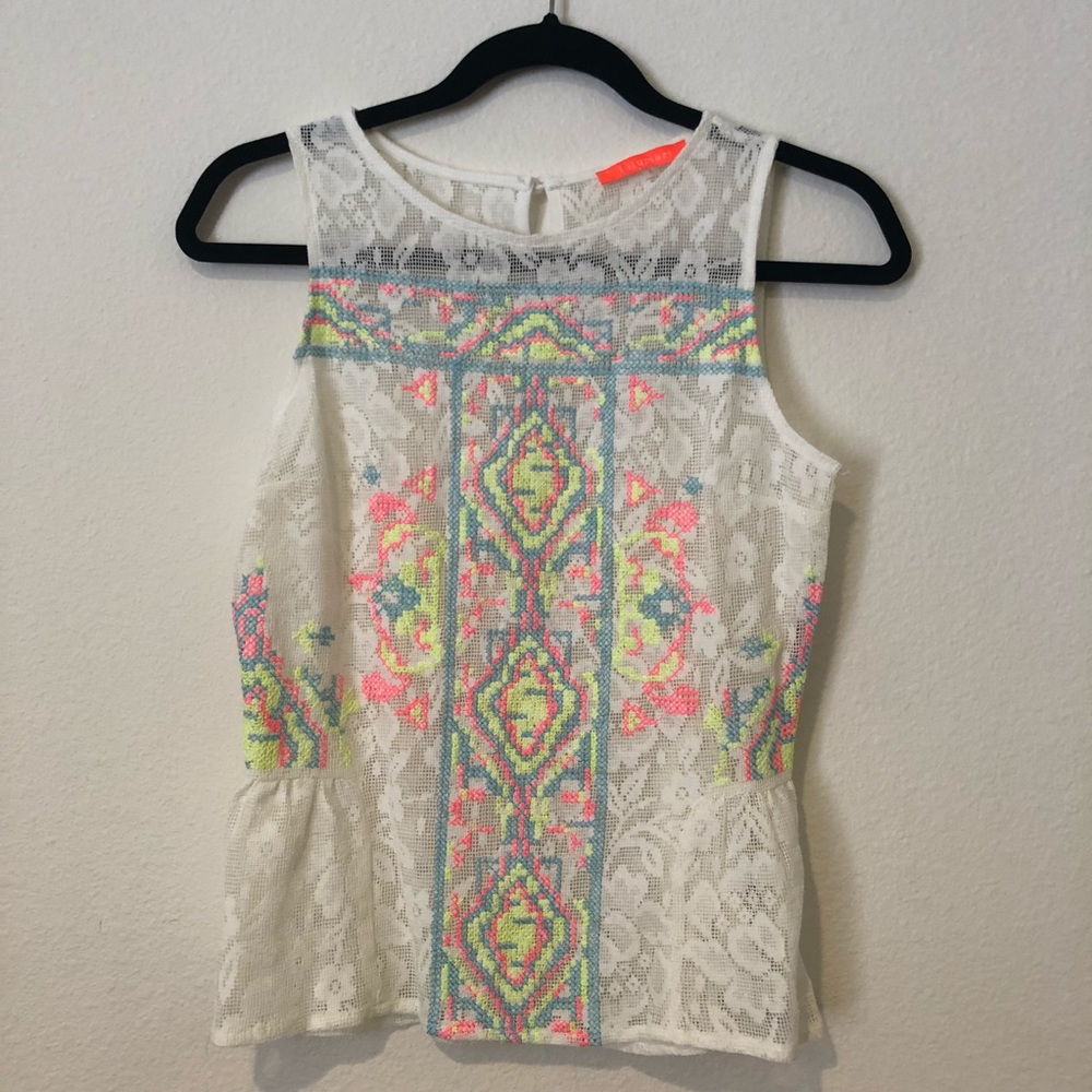 Embroidered peplum top